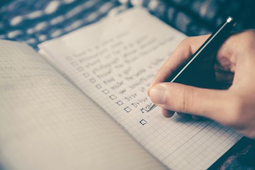 notebook with checklist